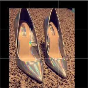 Pair of silver colored leathered heel